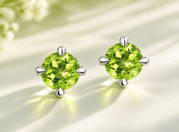 Natural Peridot 4-prong Earrings in Sterling Silver by AME Jewellery.