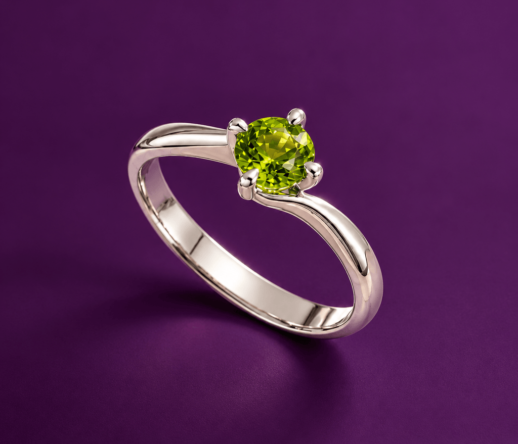 Natural Peridot Solitaire Twist Ring in Sterling Silver by AME Jewellery.