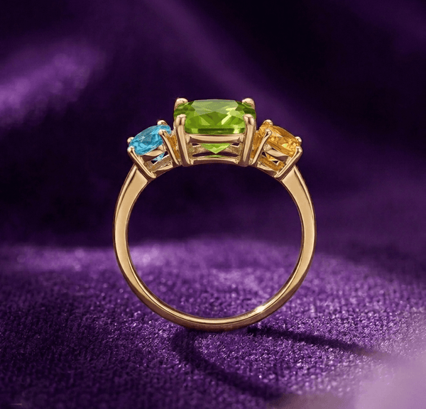 Bague en or jaune 14K avec péridot, topaze bleue et citrine - AME Jewellery.