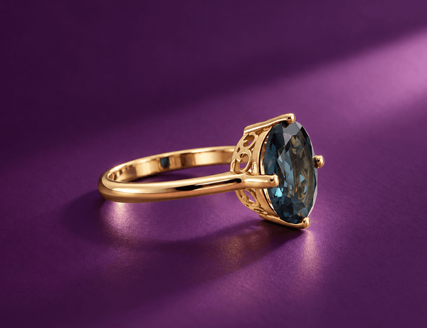 Bague en or jaune 14K et topaze bleue de Londres naturelle taille ovale - AME Jewellery.