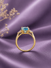 Bague en or jaune 14K et topaze bleue naturelle taille ovale - AME Jewellery.