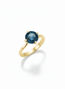 Natural Blue Topaz Twist Solitaire Ring in 14K Yellow Gold by AME Jewellery.