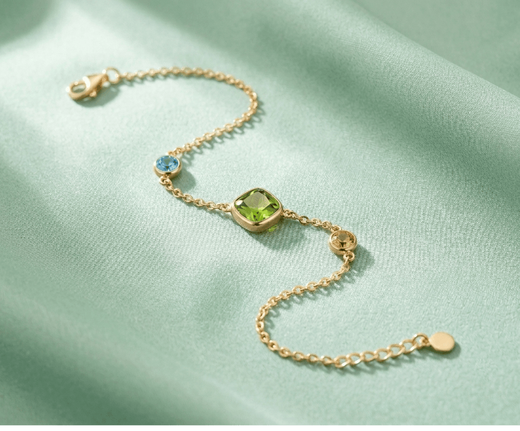 Bracelet en or jaune 14K avec péridot et topaze bleue et citrine - AME Jewellery.