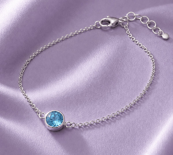 Bracelet solitaire en topaze bleue naturelle en argent sterling -  AME Jewellery.