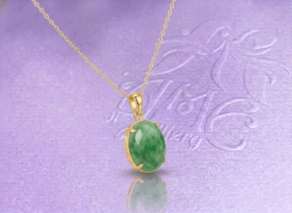 Experience timeless elegance with this exquisite jadeite pendant necklace, crafted in 14-karat yellow gold by AME Jewellery.