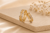 Discover the enchanting elegance of Celtic knot rings, expertly crafted in 14-karat yellow and white gold by AME Jewellery.