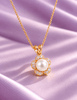 White Freshwater Pearl Apricot Blossom Flower Pendant Necklace in 14-karat Yellow Gold by AME Jewellery. 