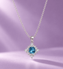 Natural Blue Topaz Halo Pendant in Sterling Silver - AME Jewellery