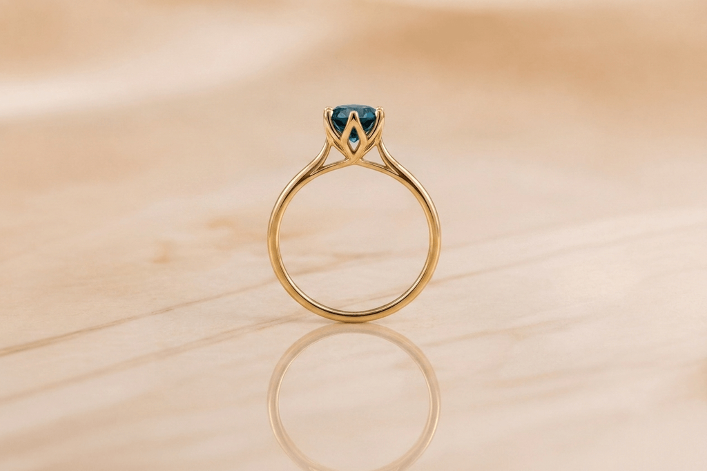 Natural Blue Topaz 6-prong Ring in 14K Yellow Gold by AME Jewellery.