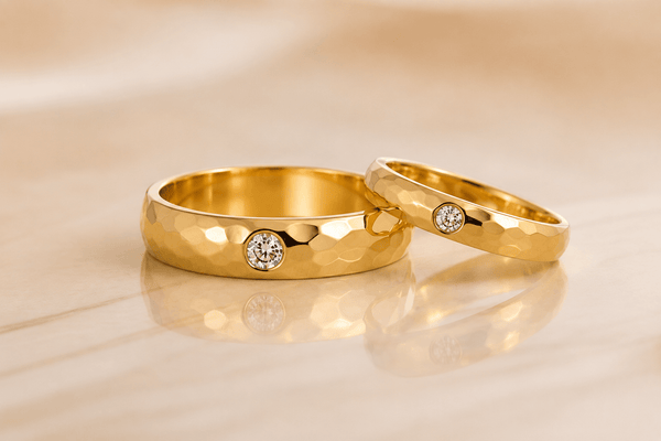 Celebrate your eternal love with the Natural Diamond Faceted Wedding Rings, expertly crafted in luxurious 18-karat yellow gold by AME Jewellery.