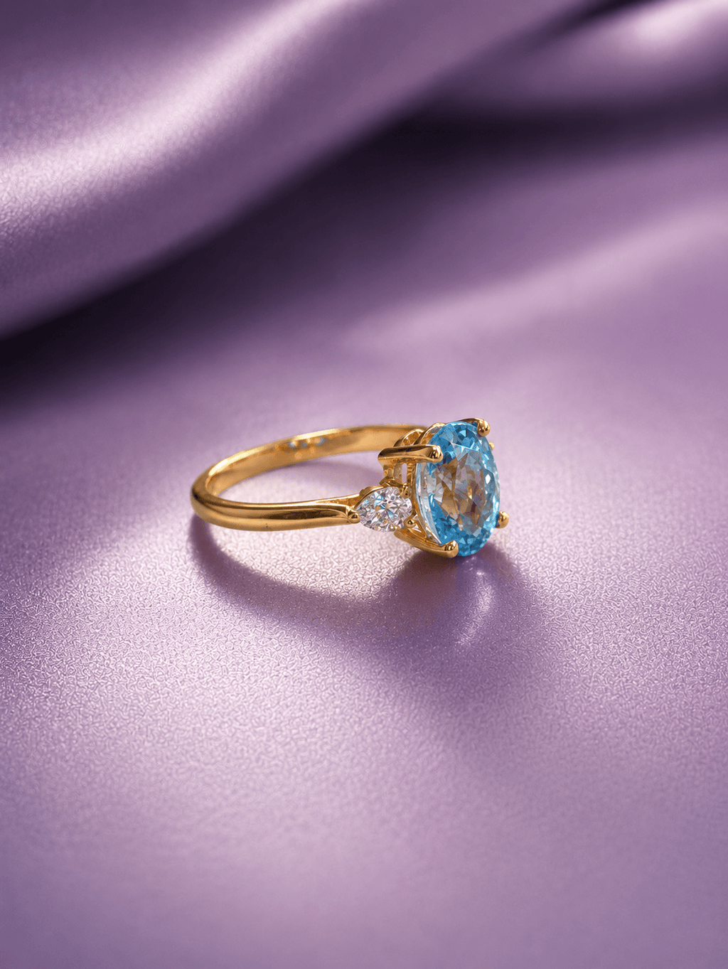 Nhẫn vàng 14K đá quý tự nhiên Blue topaz bầu dục - AME Jewellery