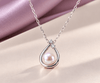 Collier pendentif en argent sterling avec perle de culture d'eau douce blanche de 6,5 mm par AME Jewellery pour femme. 