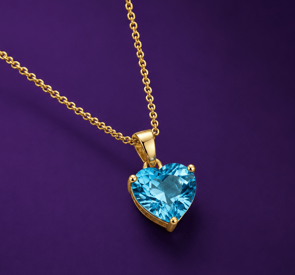Pendentif en or jaune 14K et topaze bleue naturelle en forme de cœur – AME Jewellery.