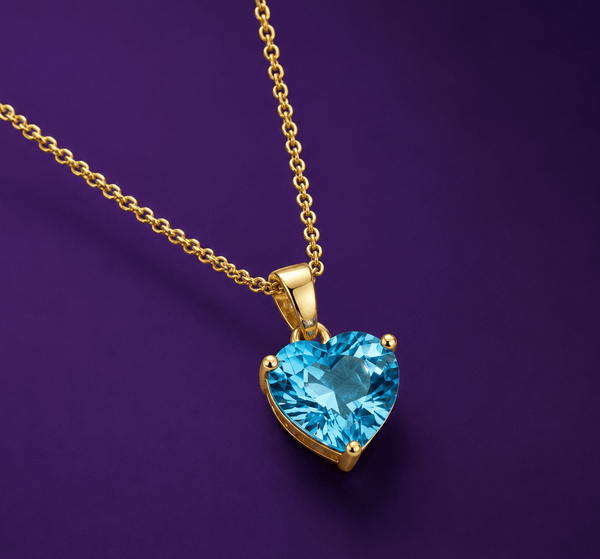 Pendentif en or jaune 14K et topaze bleue naturelle en forme de cœur – AME Jewellery.
