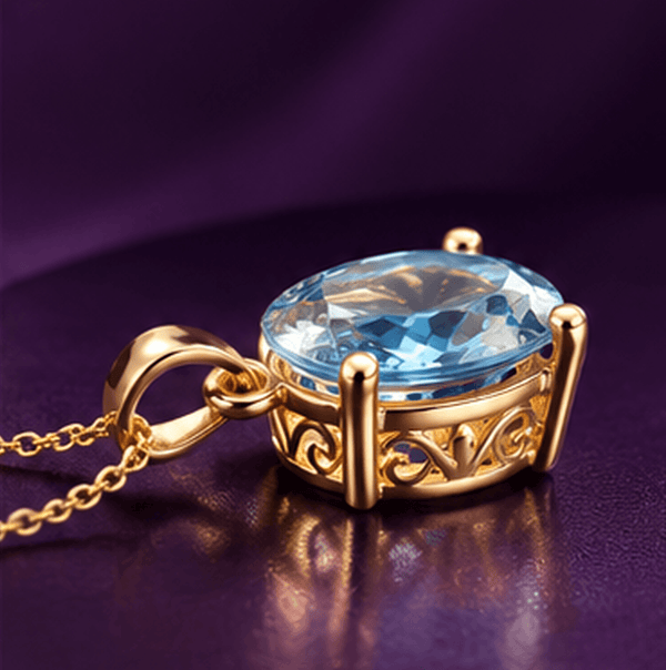 Pendentif en or jaune 14K et topaze bleue naturelle taille ovale – AME Jewellery.