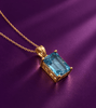 Pendentif en or jaune 14K et topaze bleue naturelle taille en baguette – AME Jewellery.