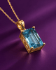 Pendentif en or jaune 14K et topaze bleue naturelle taille en baguette – AME Jewellery.