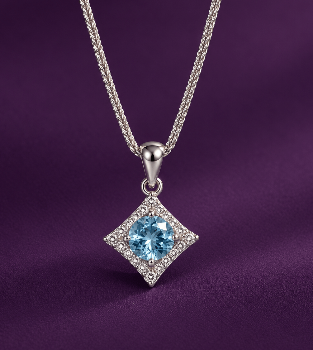 Pendentif parallélogramme en topaze bleue de Suisse en argent sterling - AME Jewellery.