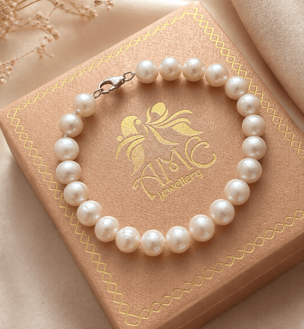 White Freshwater Cultured Pearl Strand Bracelet with Sterling Silver Clasp by AME Jewellery.