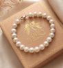 White Freshwater Cultured Pearl Strand Bracelet with Sterling Silver Clasp by AME Jewellery.