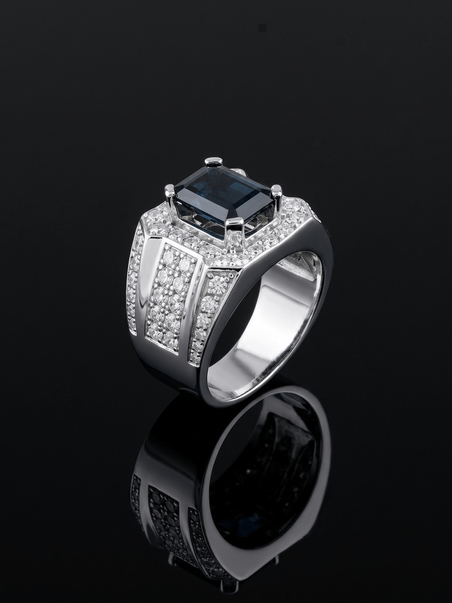 Make a bold and refined statement with this men's ring in sterling silver by AME Jewellery, featuring a natural rectangle-cut blue sapphire.