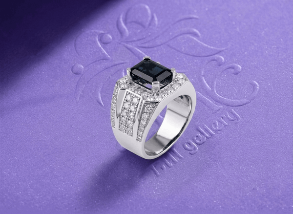 Make a bold and refined statement with this men's ring in sterling silver by AME Jewellery, featuring a natural rectangle-cut blue sapphire.