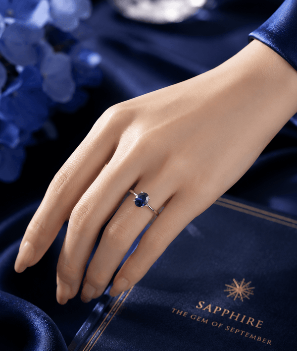 Natural Oval Blue Sapphire Ring in 10K White Gold by AME Jewellery. 