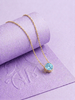 Natural Blue Zircon Bezel Pendant in 14-karat Yellow Gold by AME Jewellery.