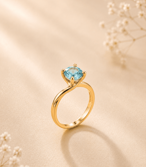 Blue Zircon Twist Solitaire Ring in 14K Yellow Gold - AME Jewellery