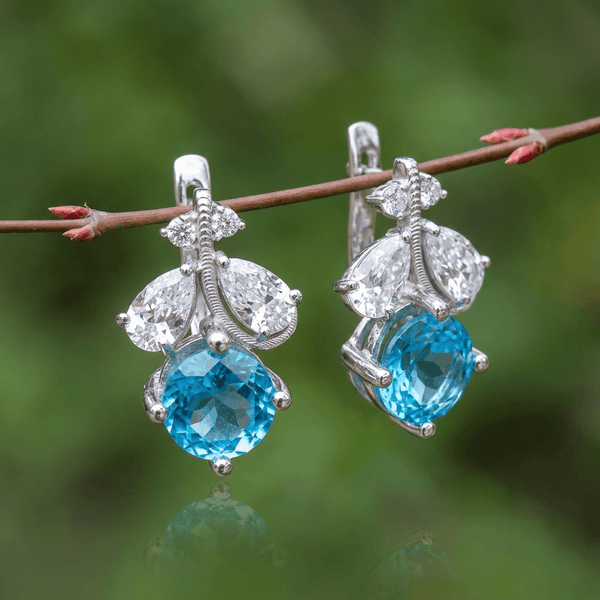 Natural Blue Topaz Leaf Latch-back Earrings in Sterling Silver by AME Jewellery.