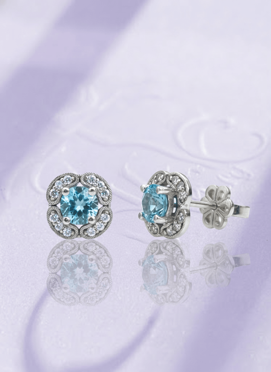 Natural Blue Topaz Earrings in Sterling Silver by AME Jewellery.