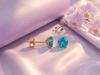 5mm Natural Blue Topaz 4-Prong Earrings in 14K Yellow Gold by AME Jewellery.