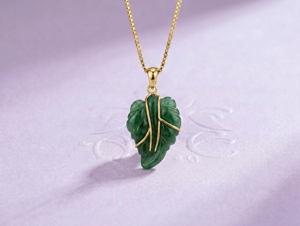 Natural Burmese Jadeite Jade Leaf Pendant Necklace in 14K Yellow Gold by AME jewellery. Timeless and versatile, this jade leaf pendant is more than a piece of jewelry