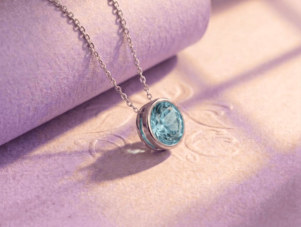 Natural Swiss Blue Topaz Solitaire Bezel Chain Necklace in Sterling Silver by AME Jewellery. 