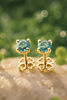Boucles d'oreilles 4 griffes en or jaune 14K avec saphir vert - AME Jewellery