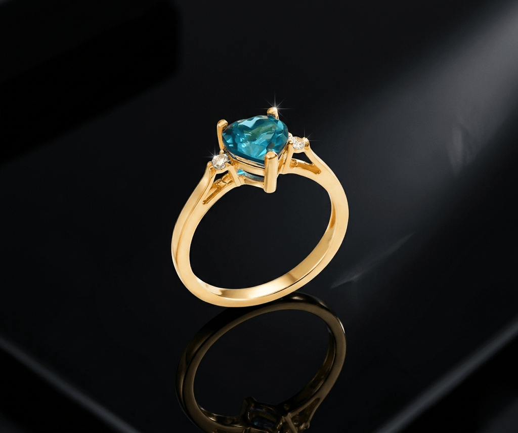 Natural Heart-cut London Blue Topaz Ring in 14K Yellow Gold by AME Jewellery.