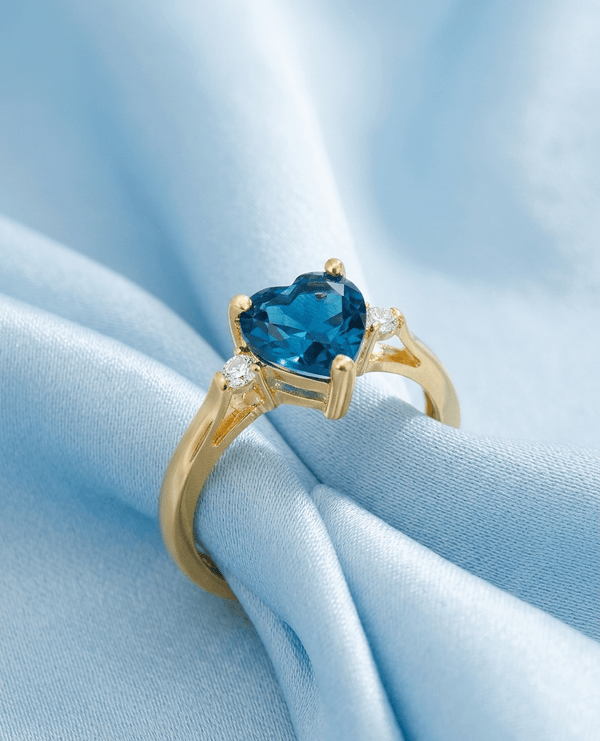 Natural Heart-cut London Blue Topaz Ring in 14K Yellow Gold by AME Jewellery.