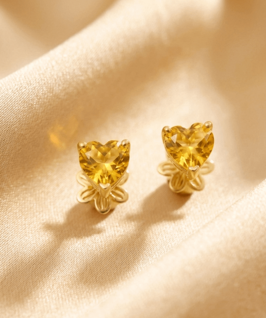 Natural heart-cut citrine stud earrings in 14K yellow gold by AME Jewellery.