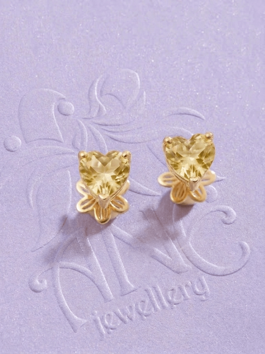Natural heart-cut citrine stud earrings in 14K yellow gold by AME Jewellery.