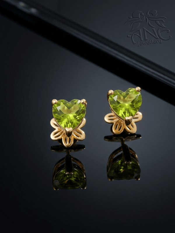 Natural Heart-cut Peridot Earrings in 14-karat Yellow Gold by AME Jewellery.