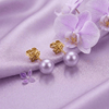 Lavender Freshwater Cultured Pearl Stud Earrings in 14-karat Yellow Gold by AME Jewellery.
