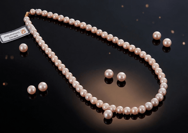 Lavender Freshwater Cultured Pearl Strand Necklace with 14-karat Yellow Gold Clasp by AME Jewellery.