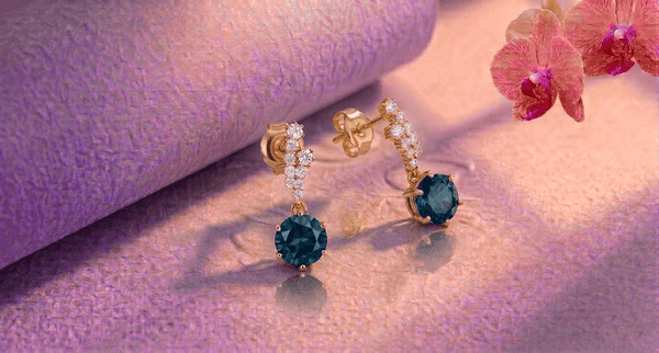 Natural London Blue Topaz Drop Earrings in 14K Yellow Gold by AME Jewellery.