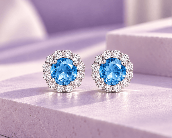 5mm Natural Blue Topaz Halo Earrings in Sterling Silver by AME Jewellery.