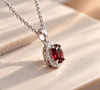 Natural oval Red Garnet Halo Pendant Necklace in Sterling Silver by AME Jewellery.