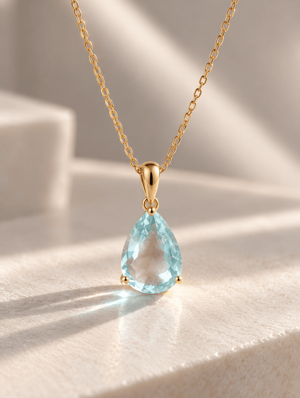 3.95-carat natural pear-cut Aquamarine pendant in 14K yellow gold by AME Jewellery. 