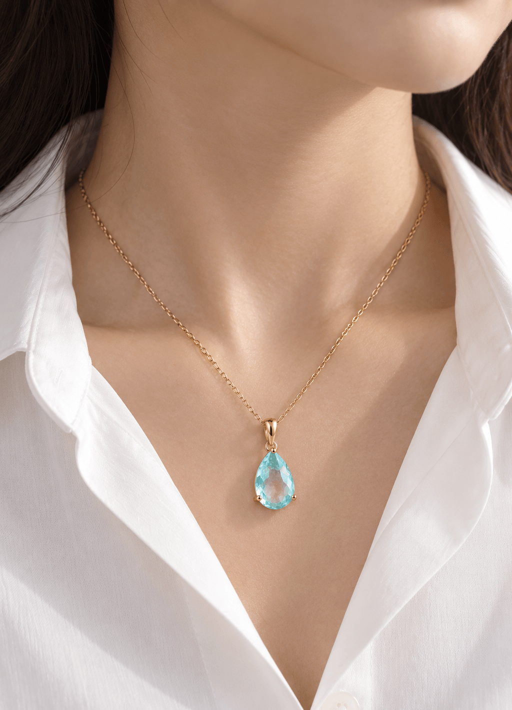 3.95-carat natural pear-cut Aquamarine pendant in 14K yellow gold by AME Jewellery. 