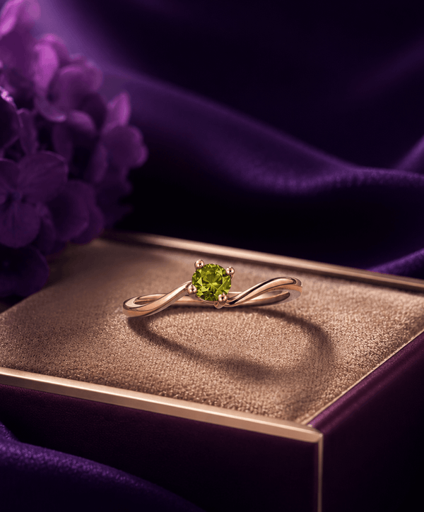 Natural Peridot Solitaire Twist Ring in 14K Rose Gold by AME Jewellery