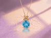 Pendentif nœud papillon en topaze bleue naturelle en or jaune 14K – AME Jewellery