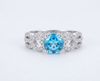 Natural Blue Topaz Twist Ring in Sterling Silver by AME Jewellery. 